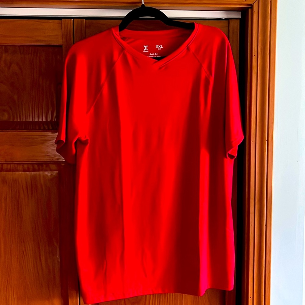 Boys Husky quick dry shirt.  Pit to pit is 22”; length is 28”.